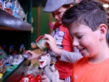 Happy kids shopping at our dinosaur park gift shop